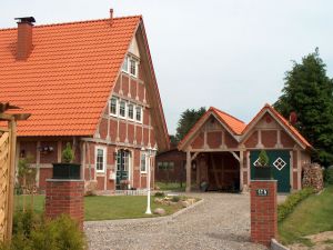 Bild: Beispiel 11 Bauweise: Fertighaus, industrielle Vorfertigung Bauart: Holzhaus, Blockhaus